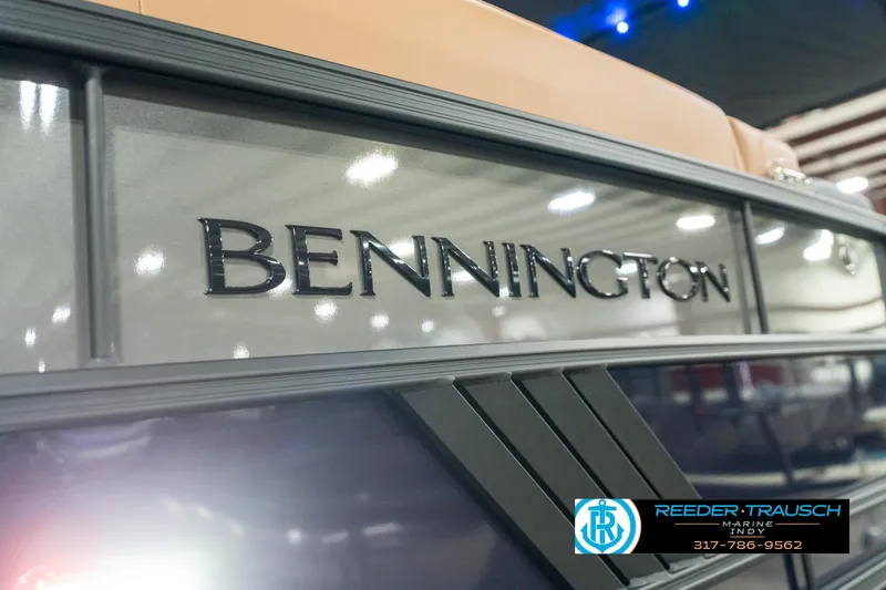 Slide: The Image of 2025 Bennington 24 MSB boat with sleek design and branding. - 47