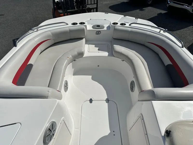 Slide: The Image of 2018 Godfrey Hurricane 188SD boat interior with spacious seating and cup holders. - 10