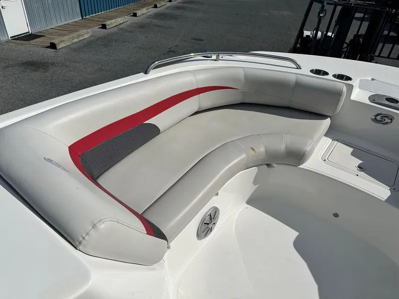 Slide: The Image of 2018 Godfrey Hurricane 188SD boat with white and red cushioned seating. - 14