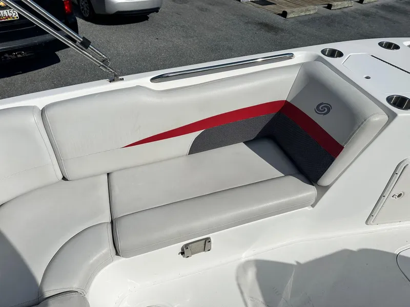 Slide: The Image of 2018 Godfrey Hurricane 188SD boat interior with gray and red seating. - 16