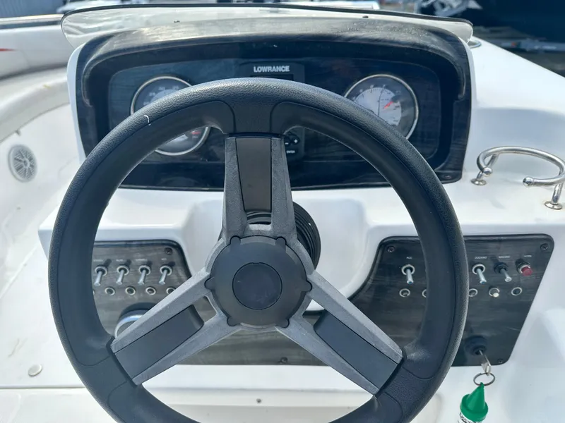 Slide: The Image of Steering wheel and dashboard of 2018 Godfrey Hurricane 188SD boat. - 4
