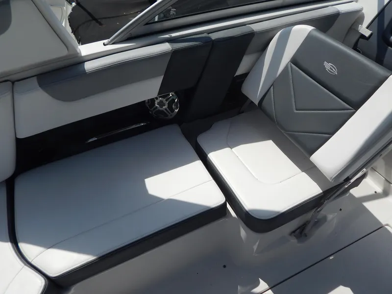 Slide: The Image of 2019 Chaparral 230 Suncoast boat interior with gray and white seating. - 20