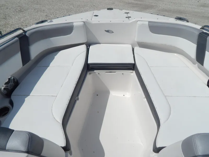 Slide: The Image of 2019 Chaparral 230 Suncoast boat interior with spacious seating and modern design. - 28