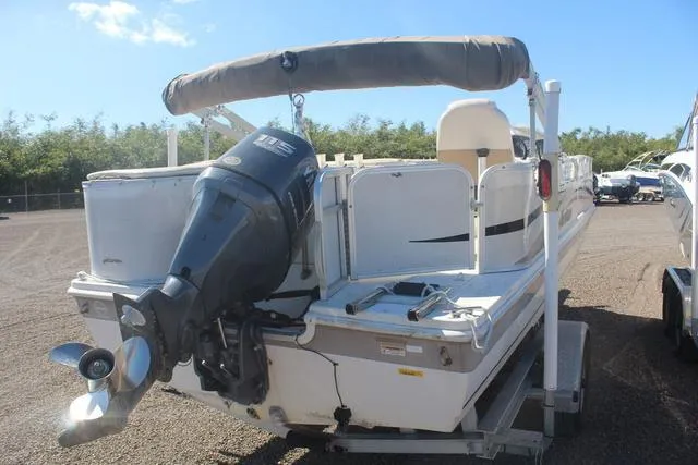 Slide: The Image of 2007 Hurricane FunDeck 196 RE3 boat with outboard motor on trailer. - 4
