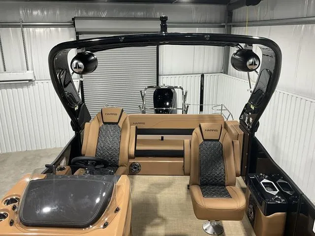 Slide: The Image of 2025 Harris GRAND MARINER 250 SLDH interior with luxury seating and modern design. - 12