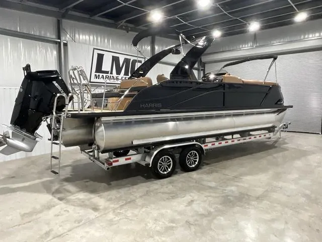 Slide: The Image of 2025 Harris GRAND MARINER 250 SLDH pontoon boat on trailer in showroom. - 4