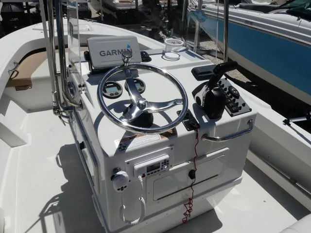 Slide: The Image of Center console of a 2019 Parker 1801 CC boat with Garmin navigation system. - 8