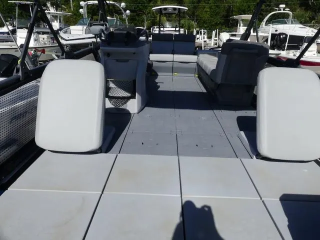 Slide: The Image of 2023 Sea-Doo Switch® 16-130 hp pontoon boat interior with spacious seating and modern design. - 6