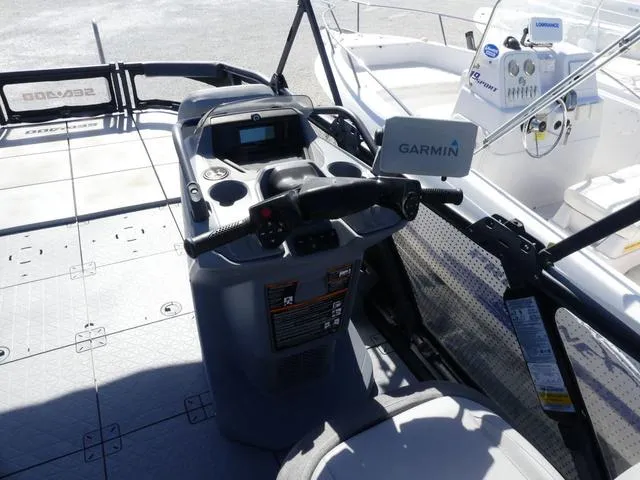 Slide: The Image of 2023 Sea-Doo Switch® 16-130 hp boat dashboard with Garmin navigation system. - 8