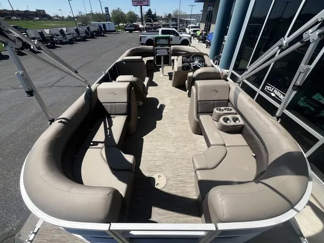 Slide: The Image of 2022 Bennington 22 SXSR Tri-Toon Pontoon with spacious seating and modern design. - 14