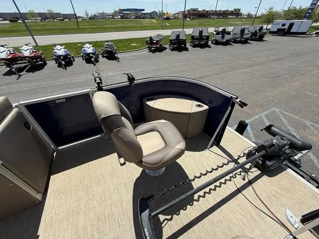 Slide: The Image of 2022 Bennington 23 SFXAPG pontoon boat interior with seating and fishing equipment. - 12