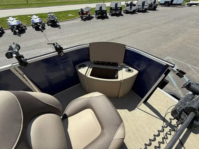 Slide: The Image of 2022 Bennington 23 SFXAPG boat interior with seating and storage compartment. - 13