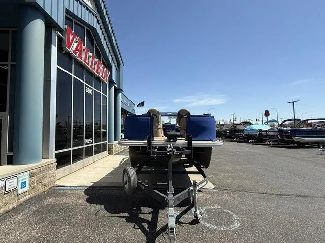 Slide: The Image of 2022 Bennington 23 SFXAPG boat on trailer outside dealership. - 3