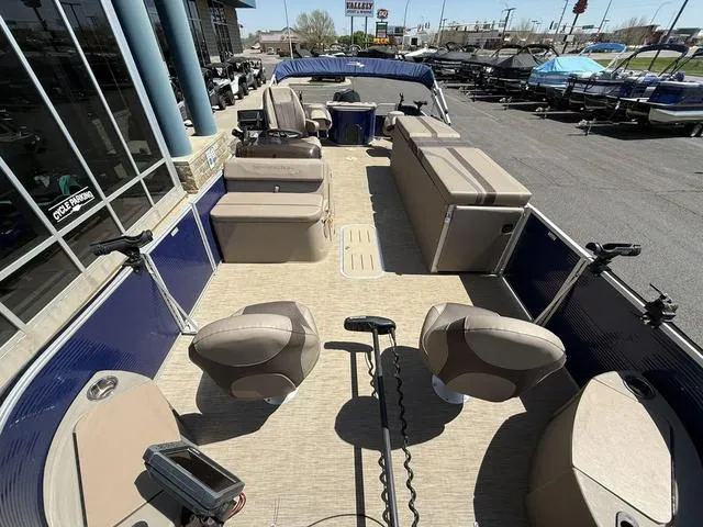 Slide: The Image of 2022 Bennington 23 SFXAPG pontoon boat interior with seating and fishing equipment. - 8