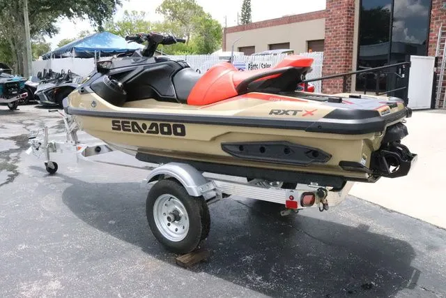 Slide: The Image of Sea-Doo RXT-X™ 325 Metallic Tan / Lava Red Premium 2025 - 4