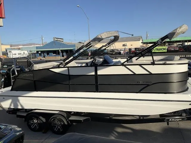 Slide: The Image of 2023 Hurricane FunDeck 2260 REF OB boat on trailer, outdoor display. - 4