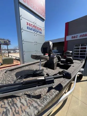 Slide: The Image of 2025 Xpress Boats XP180 at Honda Marine dealership, showcasing sleek design and advanced features. - 8