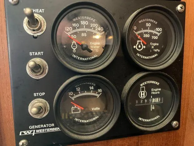 Slide: The Image of Control panel of a 1996 Bayliner 4788 with Westerbeke generator gauges. - 37