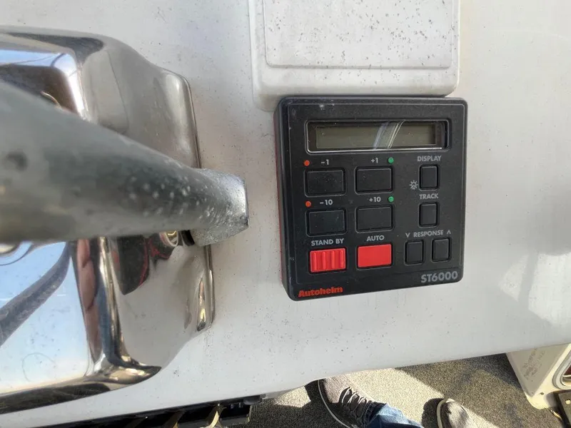 Slide: The Image of Autopilot control panel on a 1996 Bayliner 4788 yacht dashboard. - 47