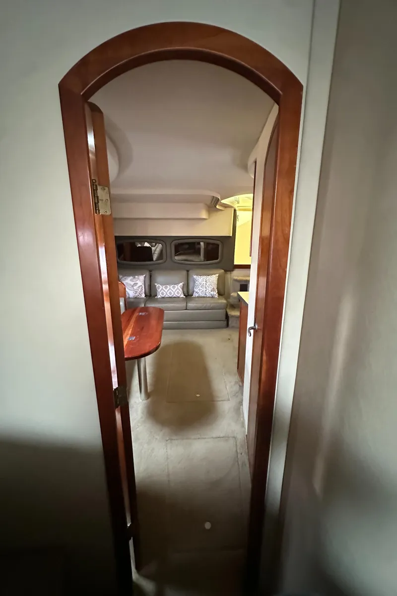 Slide: The Image of Engine room of a 2007 Cruisers 390 Sport Coupe with visible machinery and components. - 10