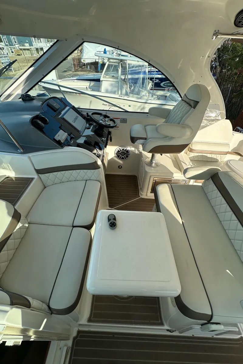 Slide: The Image of 2007 Cruisers 390 Sport Coupe interior with plush seating and modern dashboard. - 25