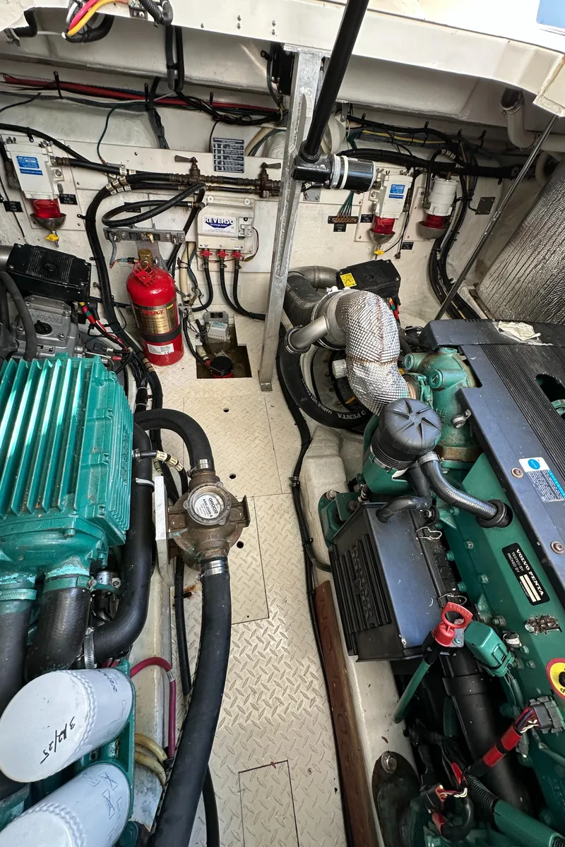 Slide: The Image of Engine room of a 2007 Cruisers 390 Sport Coupe with visible machinery and components. - 28