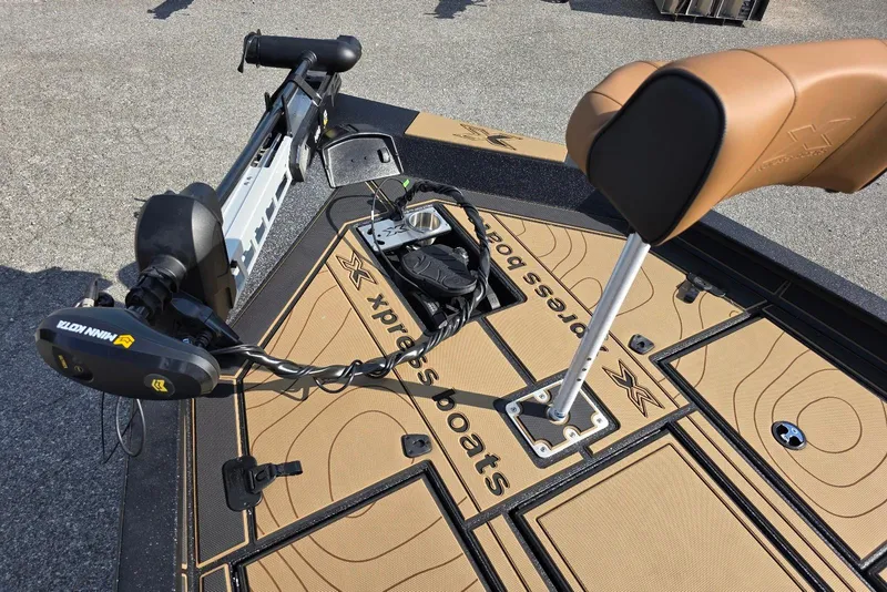 Slide: The Image of 2026 Xpress X19 Pro Bass boat deck with Minn Kota trolling motor. - 13