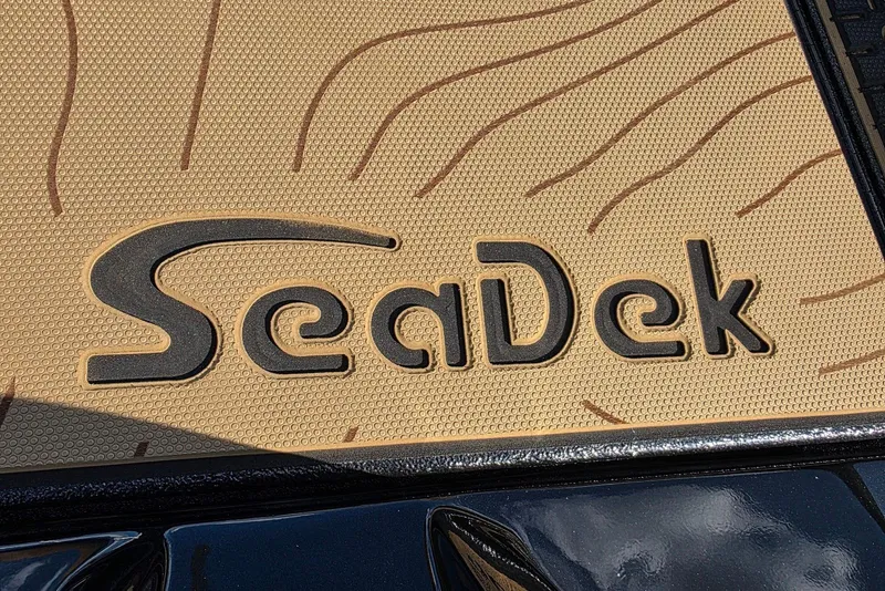 Slide: The Image of SeaDek logo on Xpress X19 Pro Bass boat, 2026 model, featuring Yamaha Vmax 200 SHO. - 15
