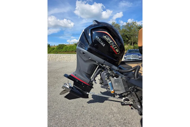 Slide: The Image of 2026 Xpress X19 Pro Bass boat with Yamaha Vmax 200 SHO engine, outdoors. - 20