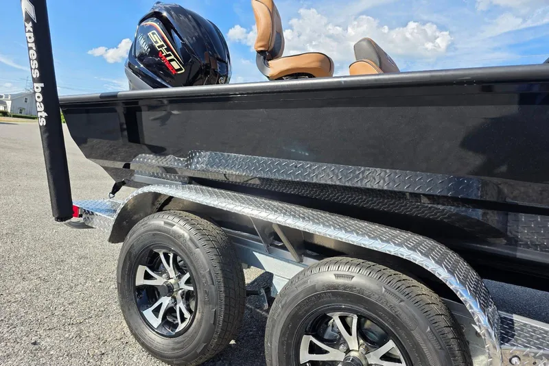 Slide: The Image of 2026 Xpress X19 Pro Bass boat with Yamaha Vmax 200 SHO engine on trailer. - 22