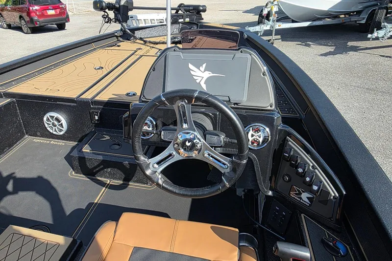 Slide: The Image of 2026 Xpress X19 Pro Bass boat interior with Yamaha Vmax 200 SHO engine. - 9