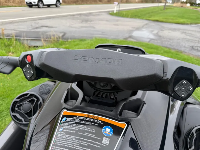 Slide: The Image of 2022 Sea-Doo GTX 170 handlebars with iBR, iDF, and audio controls. - 6