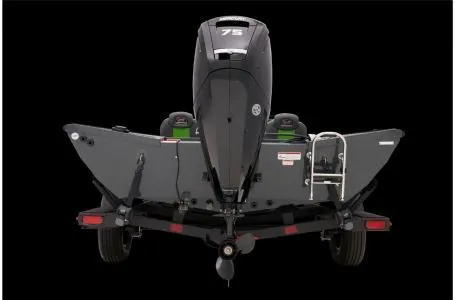 Slide: The Image of 2025 Ranger RT178 boat, rear view with motor and trailer, black background. - 13
