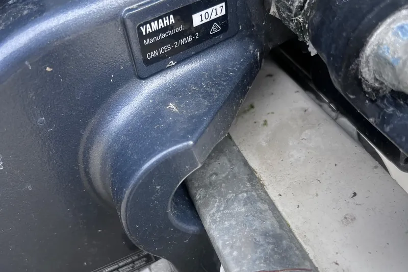 Slide: The Image of Yamaha engine component on a 1999 Parker 21 Cuddy Cabin boat. - 5