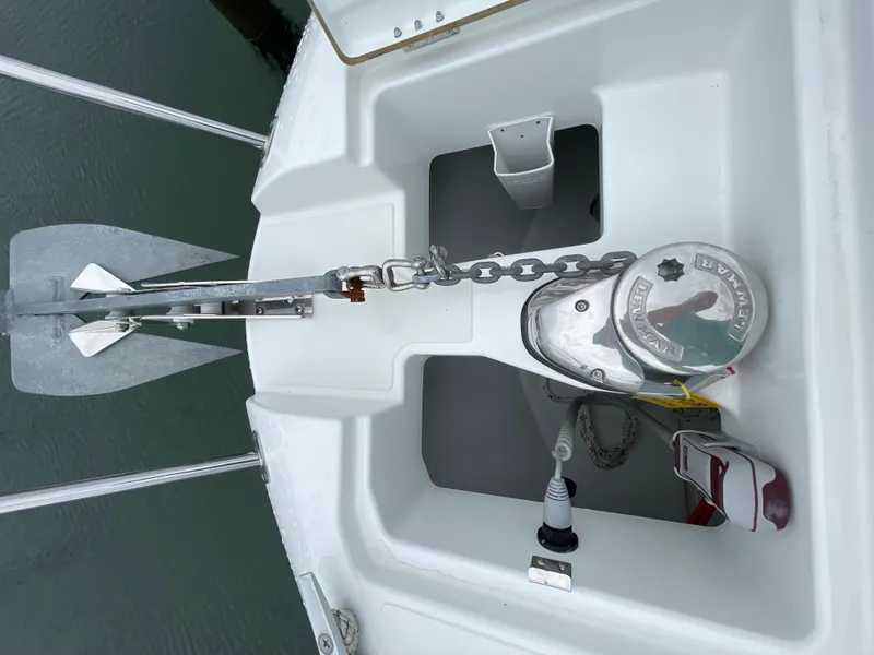 Slide: The Image of Anchor system on a 2020 Beneteau BARRACUDA 8 boat, featuring chain and winch. - 22