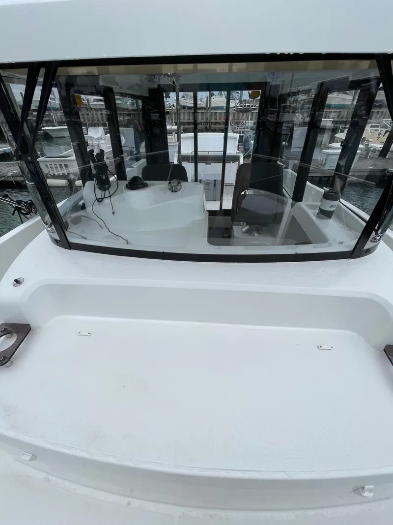 Slide: The Image of 2020 Beneteau Barracuda 8 boat with spacious cockpit and modern design. - 24