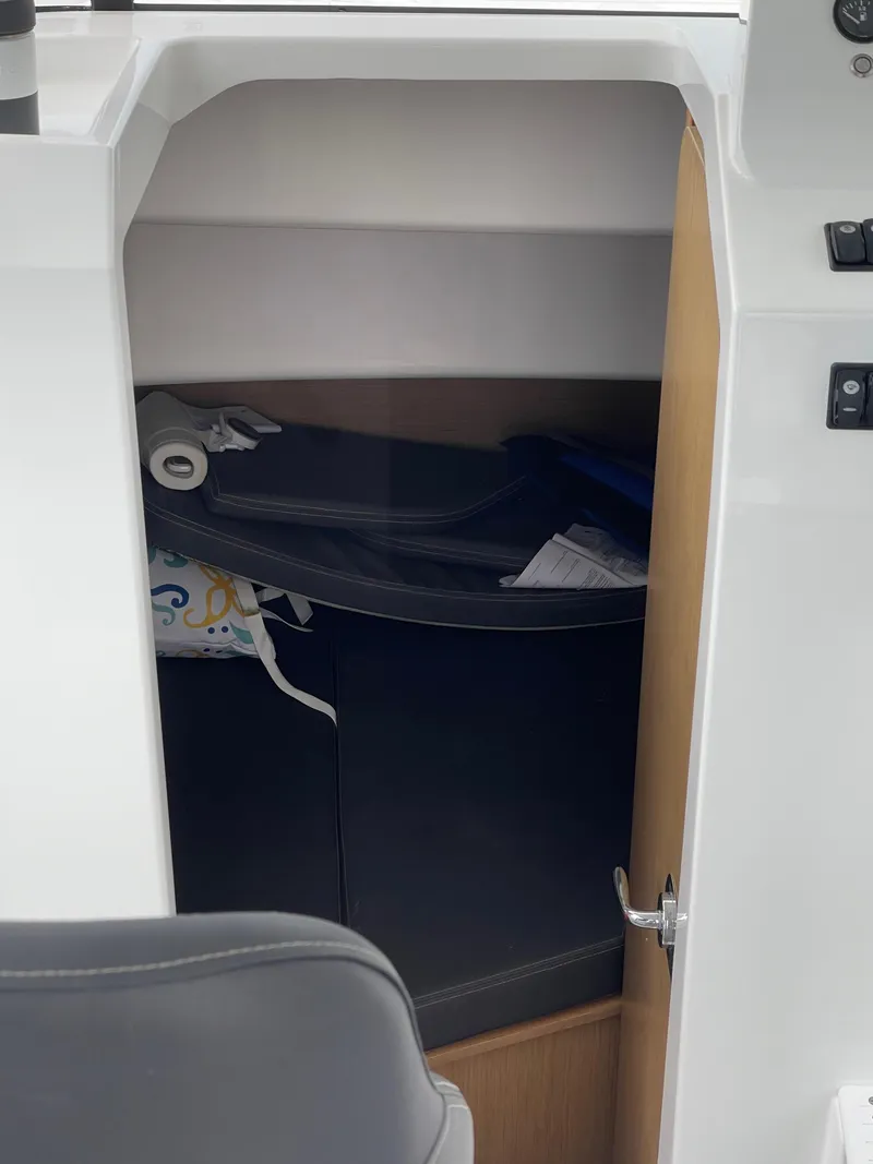 Slide: The Image of Interior cabin of 2020 Beneteau BARRACUDA 8 boat with storage space. - 30