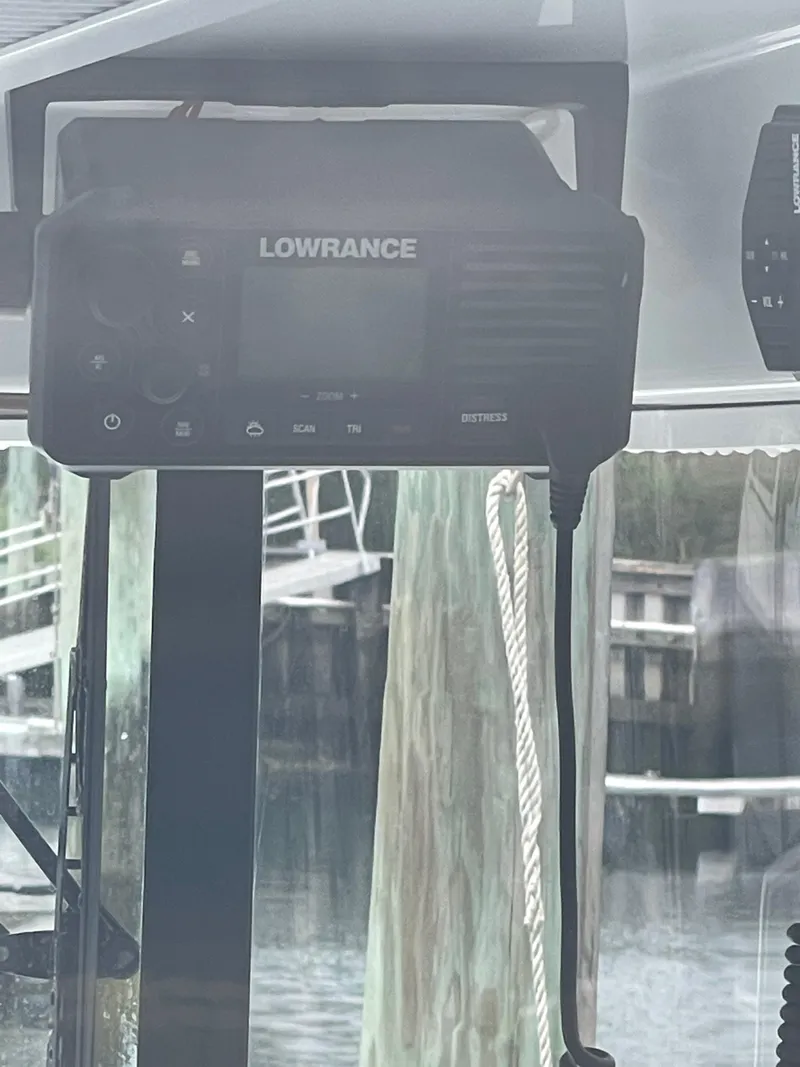 Slide: The Image of Lowrance marine device on 2020 Beneteau Barracuda 8 boat, dockside view. - 33