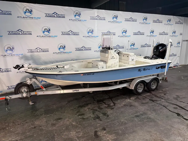 Slide: The Image of 2020 Mako 21 LTS boat with Guide Package on trailer at Atlanta Marine showroom. - 1