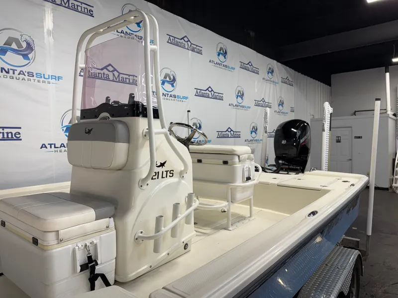 Slide: The Image of 2020 Mako 21 LTS boat with Guide Package displayed at Atlanta Marine showroom. - 10