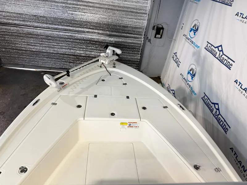 Slide: The Image of 2020 Mako 21 LTS boat with Guide Package, displayed at Atlanta Marine showroom. - 12