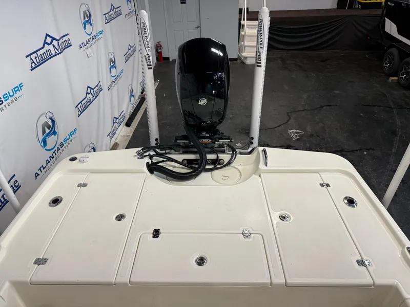 Slide: The Image of 2020 Mako 21 LTS boat with Guide Package, featuring a powerful outboard motor. - 15