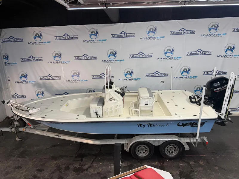 Slide: The Image of 2020 Mako 21 LTS boat with Guide Package on trailer at Atlanta Marine showroom. - 2