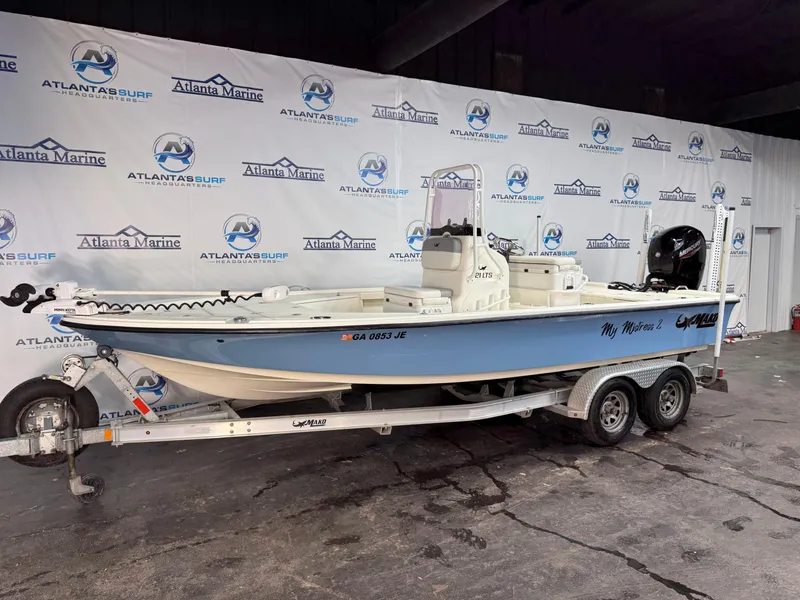 Slide: The Image of 2020 Mako 21 LTS boat with Guide Package on trailer at Atlanta Marine showroom. - 7