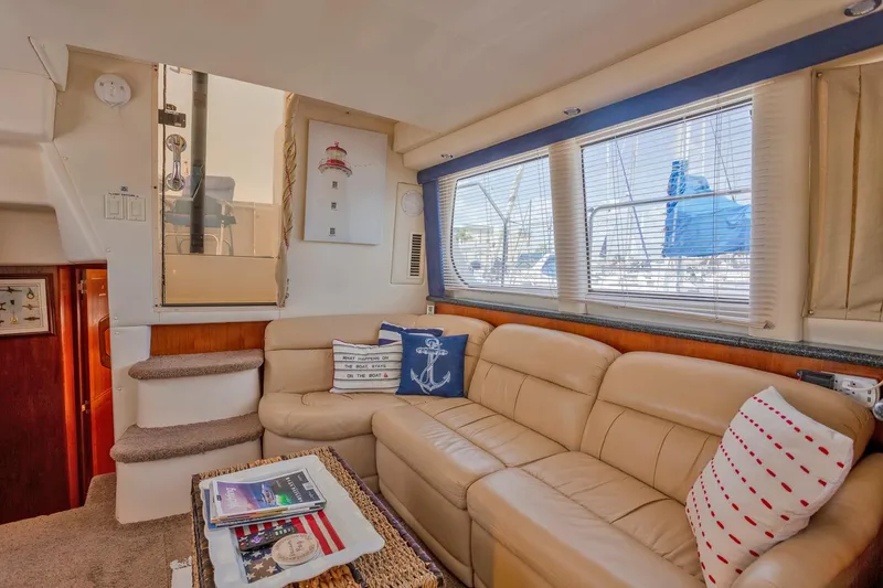 Slide: The Image of Interior of 2000 Carver 356 Aft Cabin Motor Yacht with kitchen and seating area. - 15