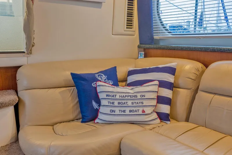 Slide: The Image of Interior of 2000 Carver 356 Aft Cabin Motor Yacht with cozy dining area. - 19