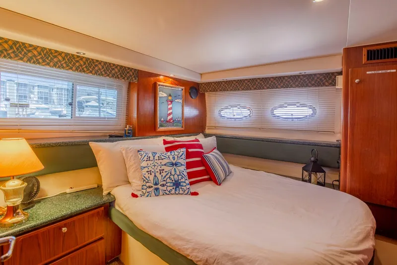 Slide: The Image of Cockpit of 2000 Carver 356 Aft Cabin Motor Yacht with navigation instruments and steering wheel. - 6