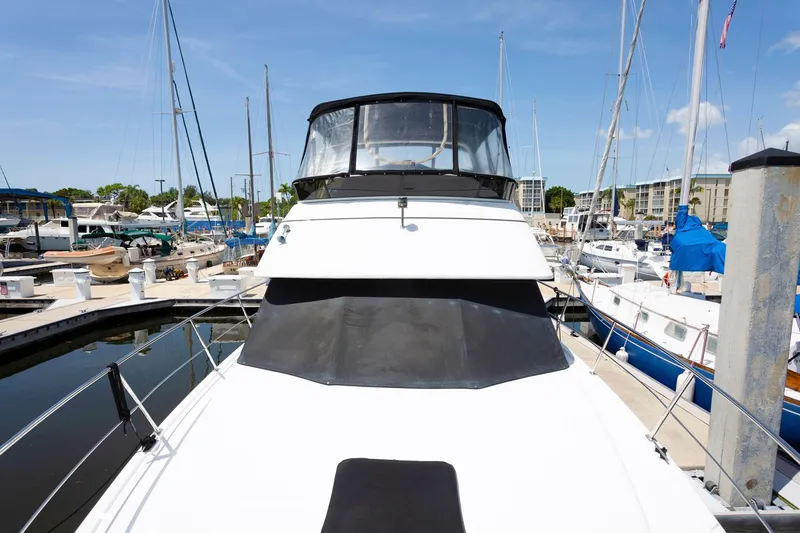 Slide: The Image of 2000 Carver 356 Aft Cabin Motor Yacht docked at marina, sunny day. - 3