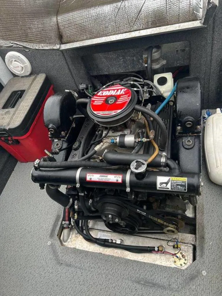 Slide: The Image of Engine compartment of a 2013 North River Commander boat, featuring a Kodiak engine. - 6