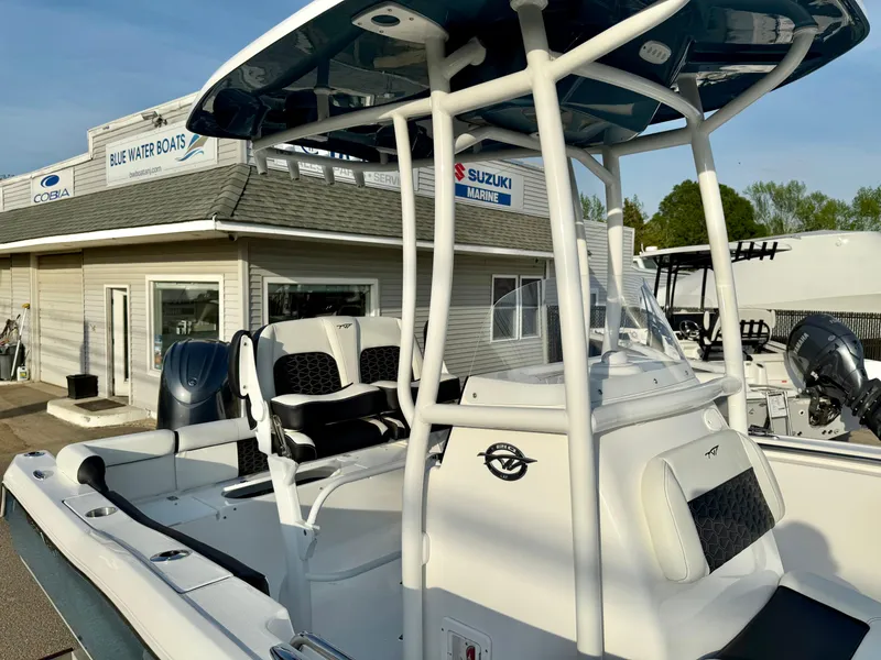 Slide: The Image of 2025 Tidewater 210 LXF boat at Blue Water Boats dealership, featuring sleek design and modern amenities. - 17
